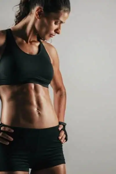Toning Up at Home: The Ultimate Guide to Bodyweight Exercises 2 Image of woman's toned stomach after bodyweight exercises Wealdstone and non-surgical treatment from Lipo 360