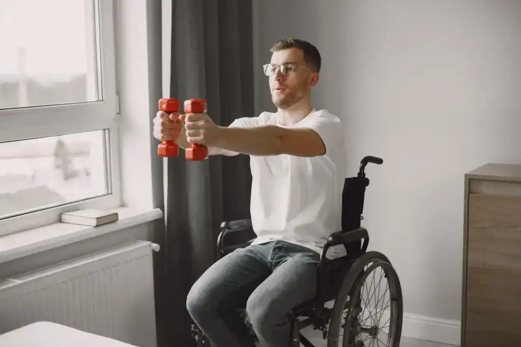 Image of man doing exercise in his wheelchair to aid weight loss Wealdstone