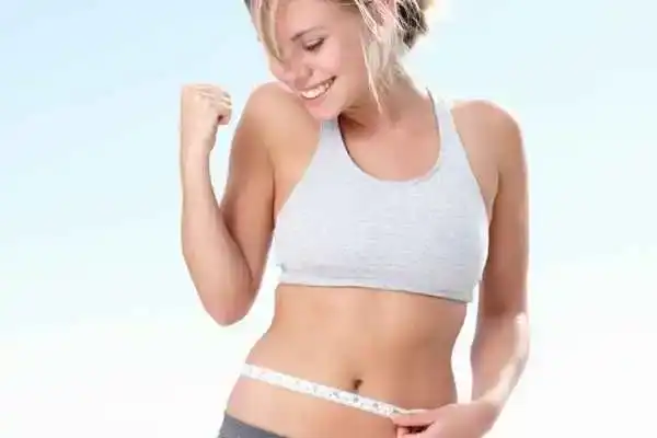 Unraveling the Mystery: Where Does the Body Fat Loss From First? 3 Image of woman happy with fat loss Wealdstone